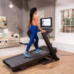 TreadmillReviews Editor Walking on NordicTrack Commercial 2450 on Incline